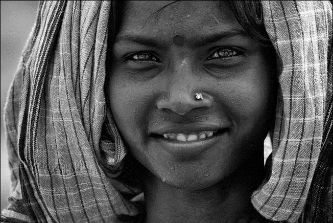 Smile of an Indian female worker By Robert